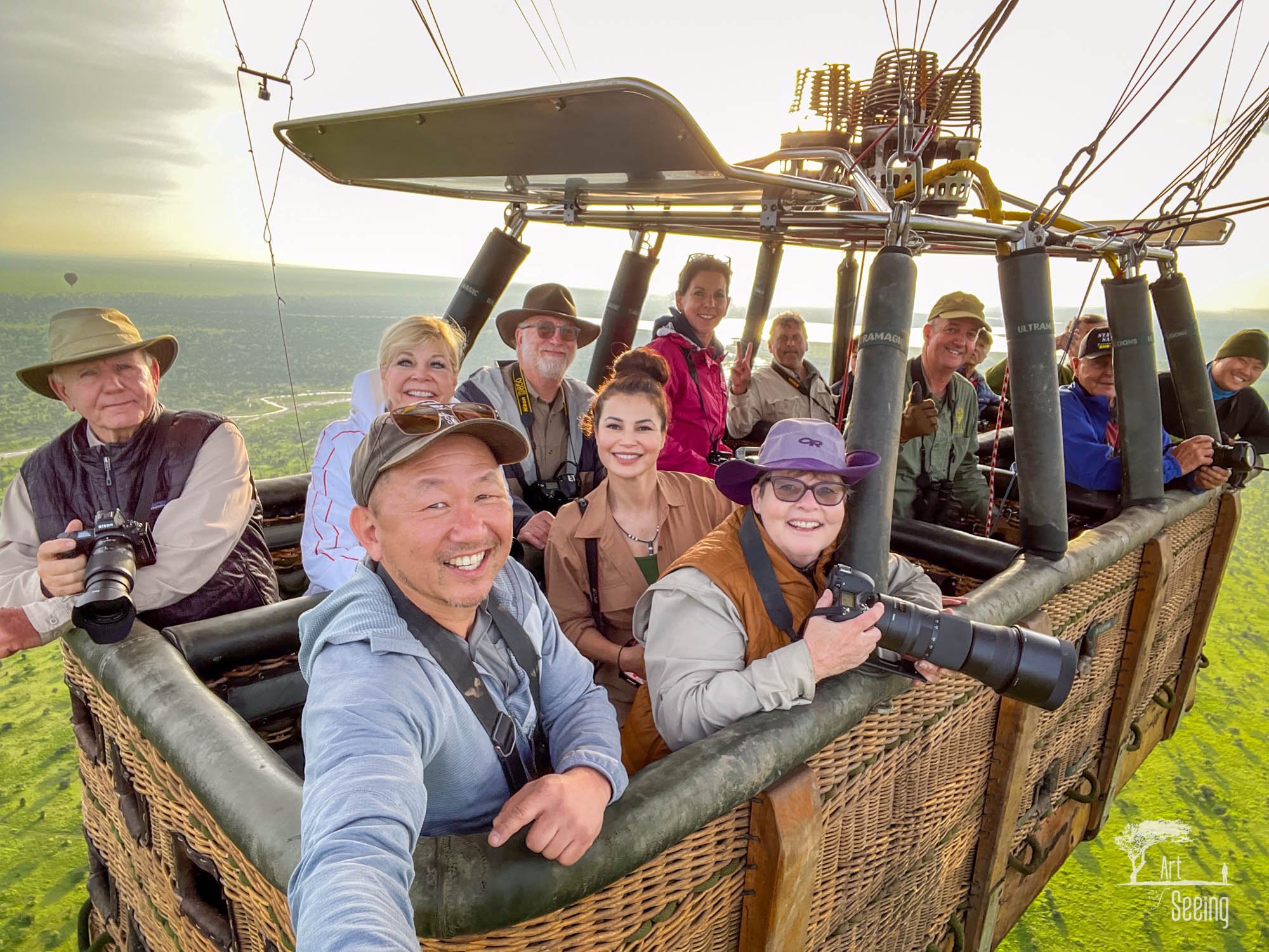 Ken Lee and an Art of Seeing group photographing from a hot-air balloon at sunrise