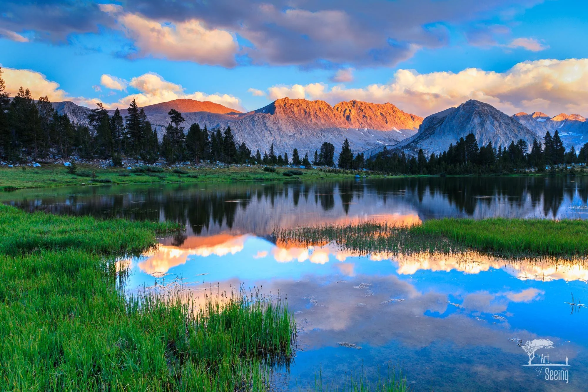Alpenglow on a High Sierra peak reflected in an alpine lake — Ansel Adams Wilderness photography workshop