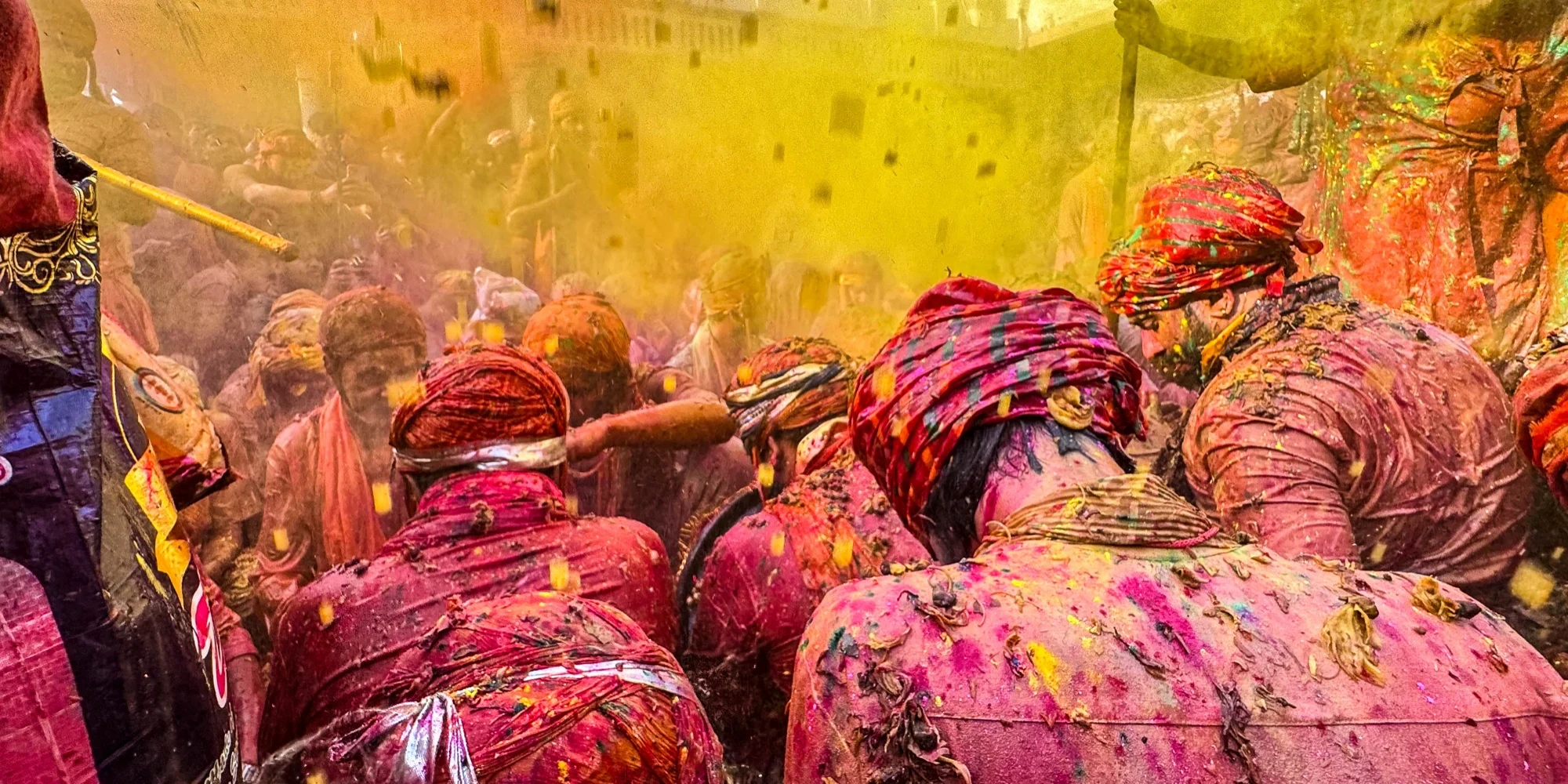 Celebrants covered in colour at a festival